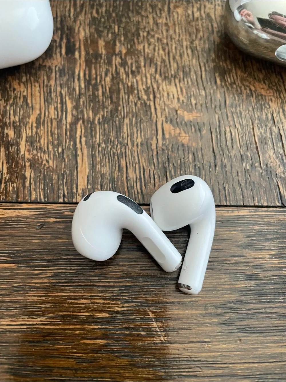 Apple White AirPods 3 with Charging Case and Silver Casetify Protective Case